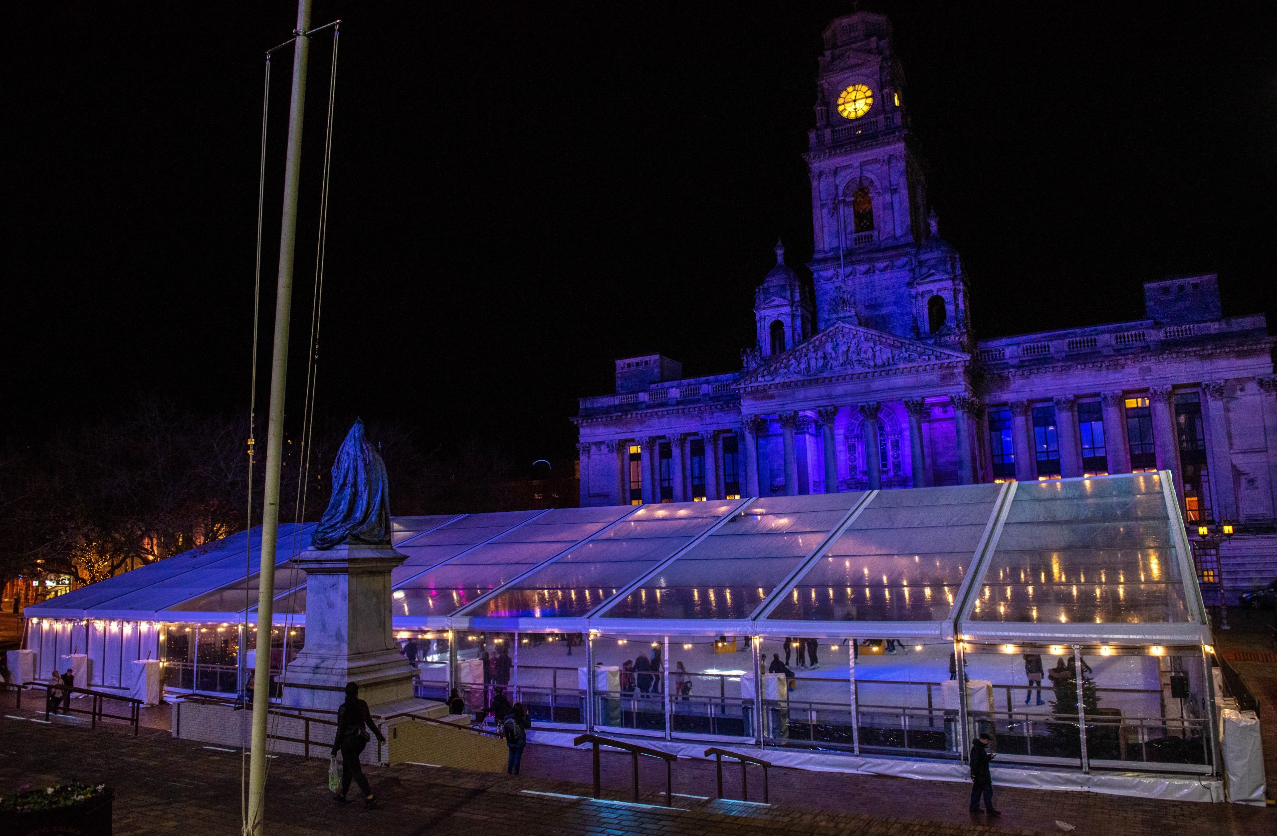 Ice rink at night outside Portsmouth Guildhall